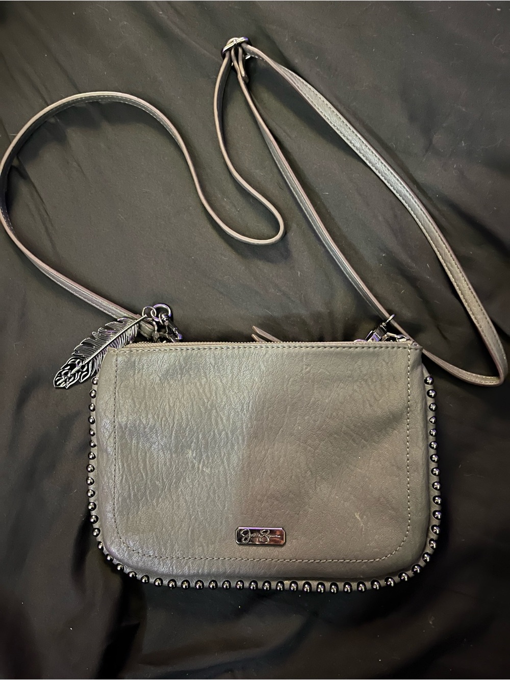 Jessica Simpson Black Stud-Trim Crossbody with Feather Charm